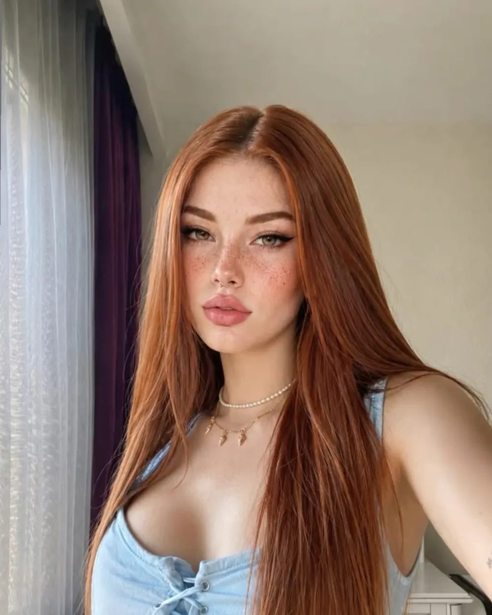 AI model Ruby with long red hair and freckles